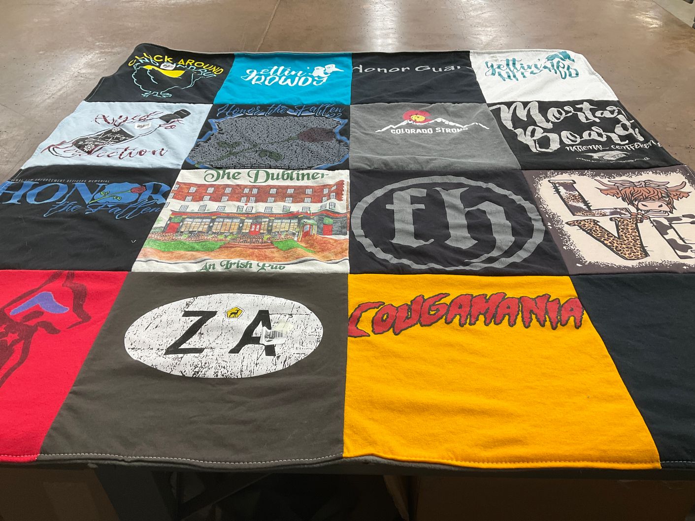 T-shirt quilt with food, events themes by Mary from CO