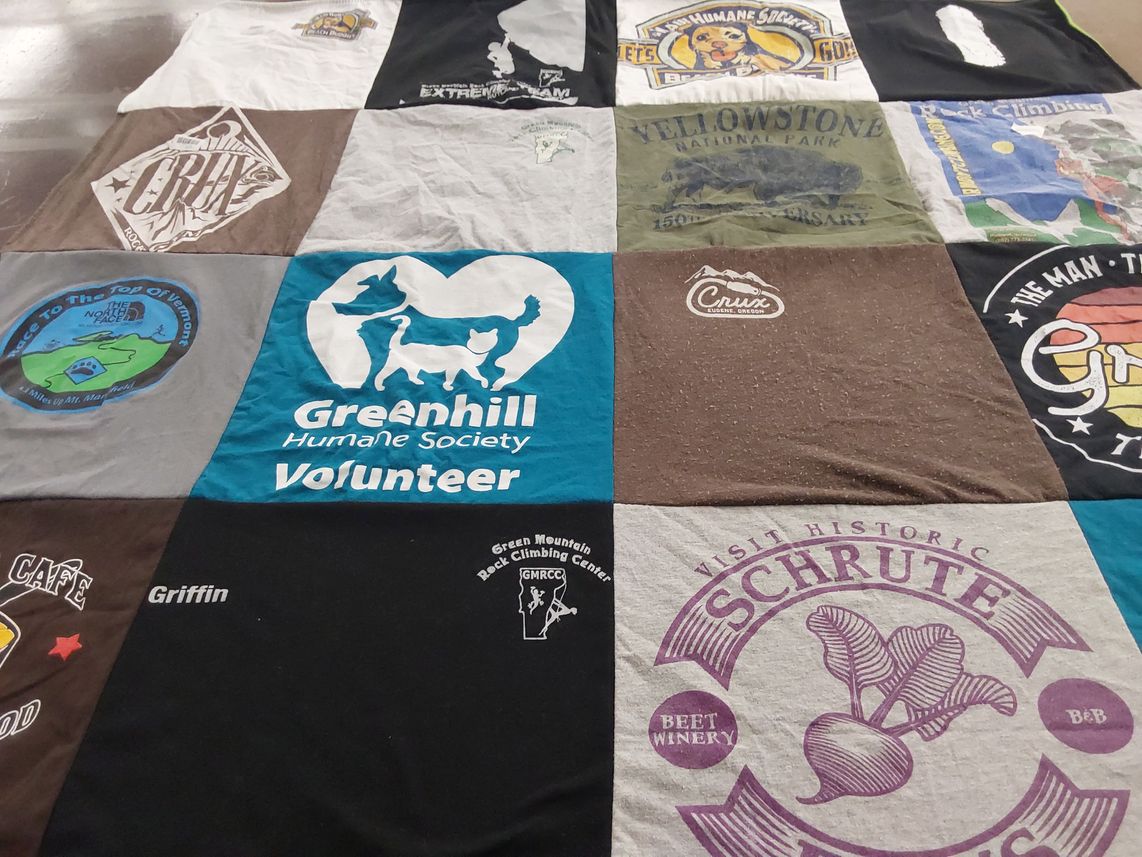 T-shirt quilt with climbing, hiking themes by Madison from OR