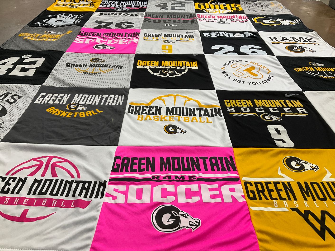 T-shirt quilt featuring green mountain rams by Cecily from CO