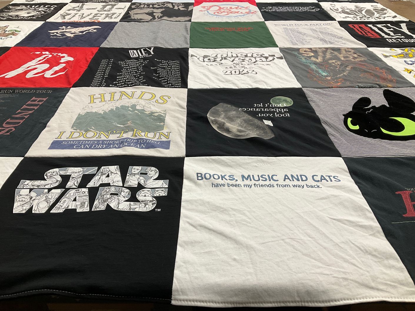 T-shirt quilt with music, books themes by Ana from CA