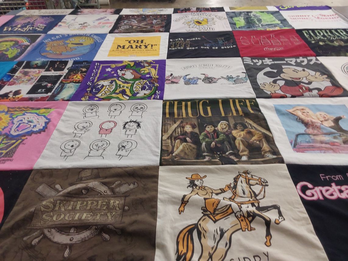 T-shirt quilt with cartoons, music themes by Nicholas from FL