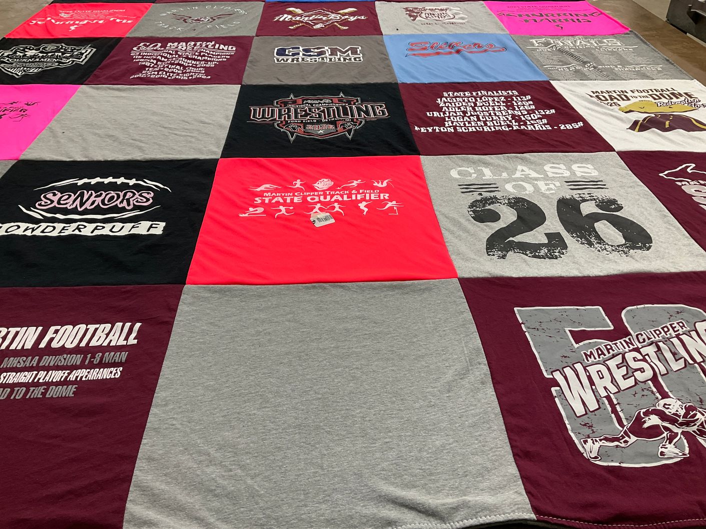 T-shirt quilt featuring martin clipper wrestling by Sarah from MI