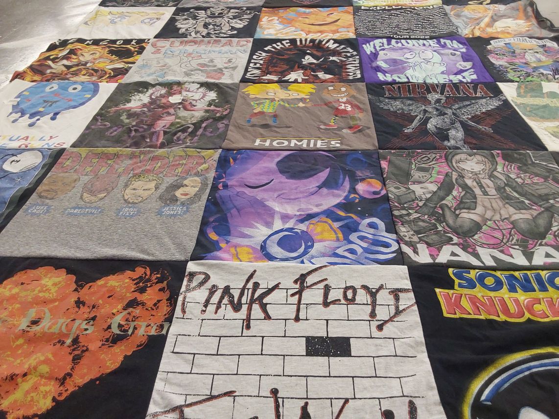 T-shirt quilt with music, comics themes by Jennifer from MS