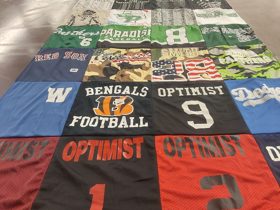 T-shirt quilt with baseball, football themes by Toni from TX