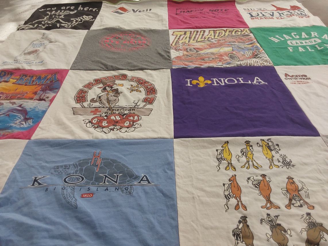 T-shirt quilt with travel, tourism themes by Amanda from LA