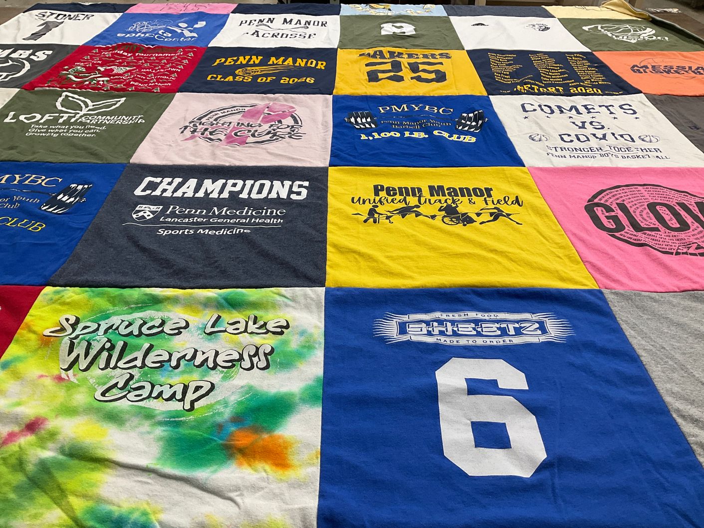 T-shirt quilt featuring penn manor unified track & field by Shandra from PA