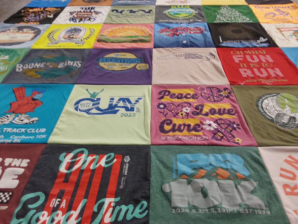T-shirt quilt with running, events themes by Jen from NC