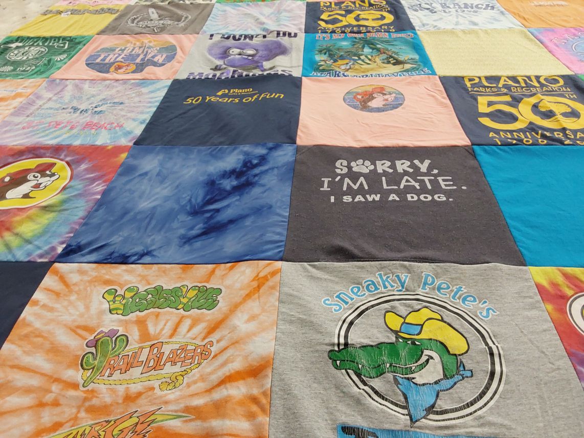 T-shirt quilt with fun, parks themes by Jenny from TX
