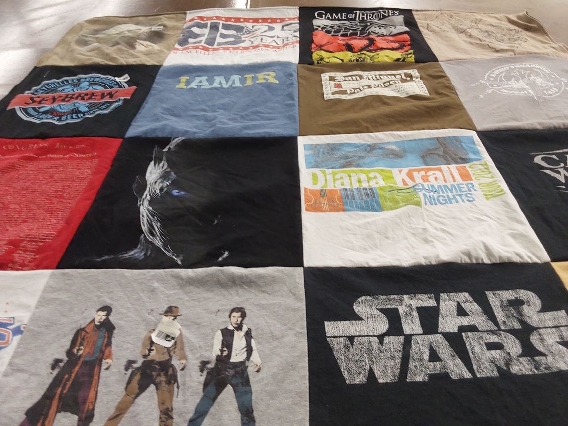 T-shirt quilt with television, music themes by Benedicto from IN