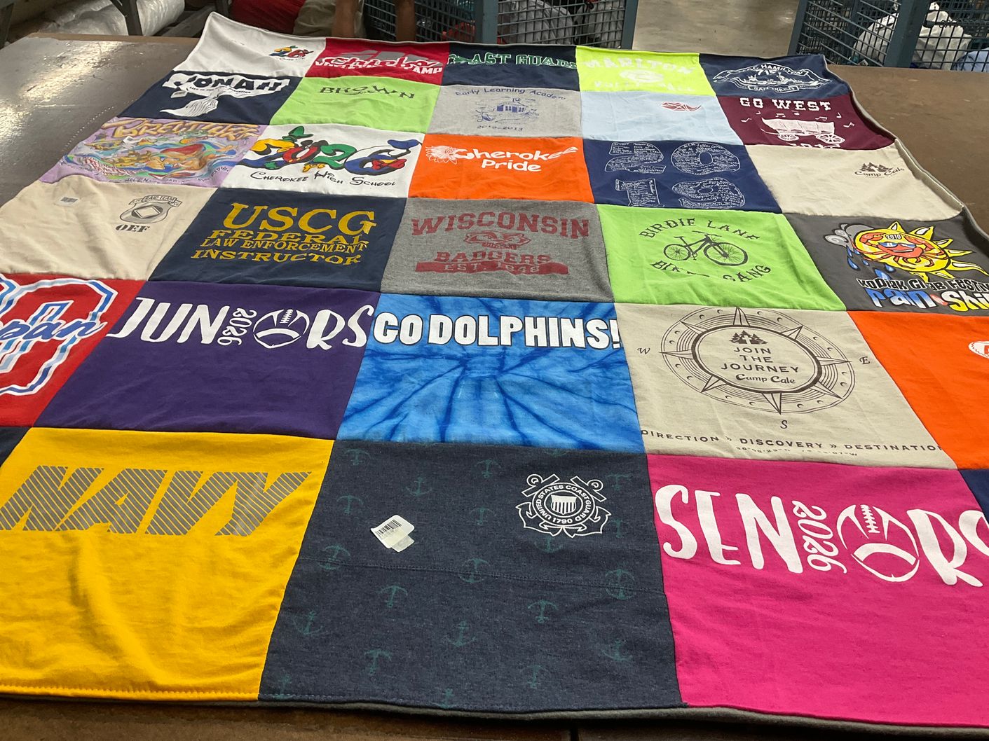 T-shirt quilt with camping, sports themes by Jennifer from NJ