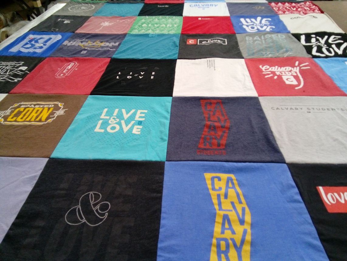 T-shirt quilt with community, youth themes by Lynette from NE