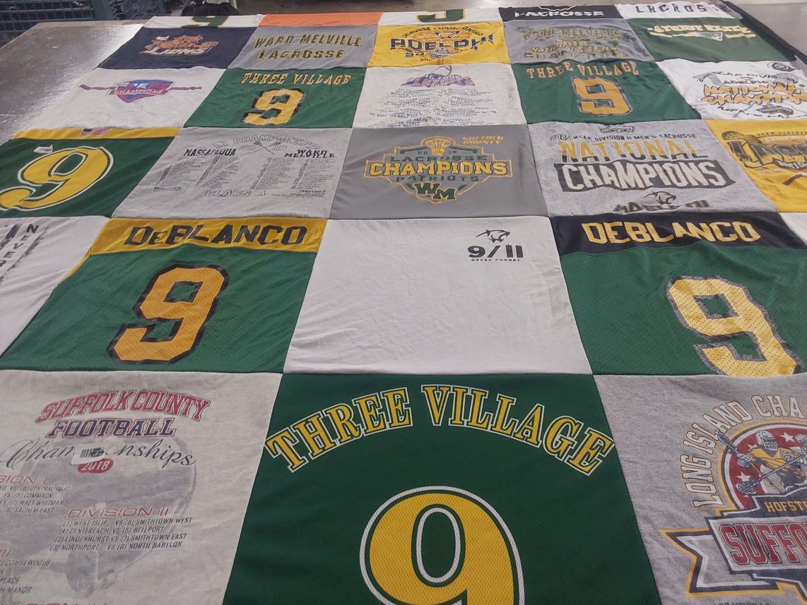 T-shirt quilt featuring three village by Gina from NY
