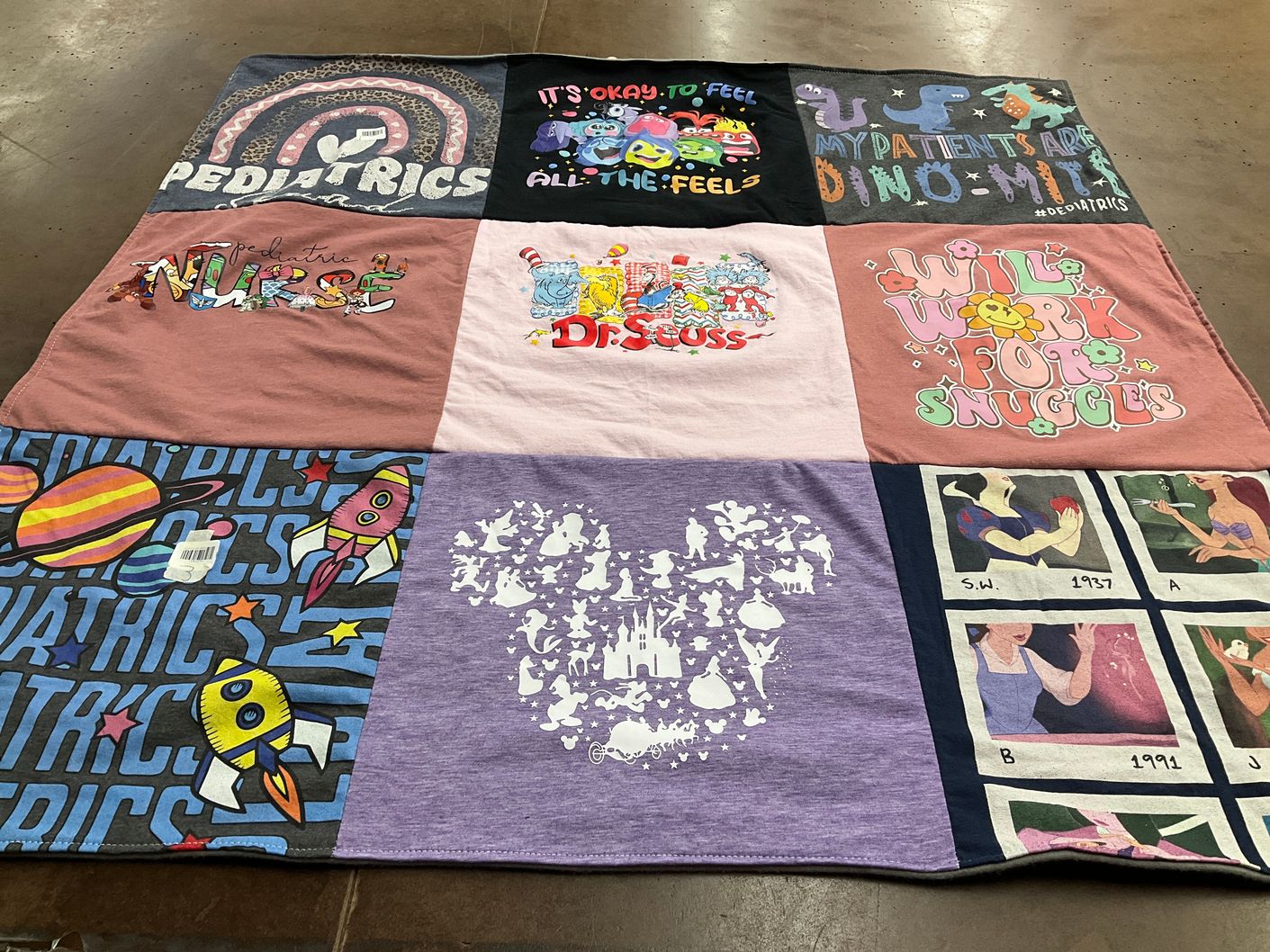 T-shirt quilt with healthcare, children's literature themes by Sara from IL