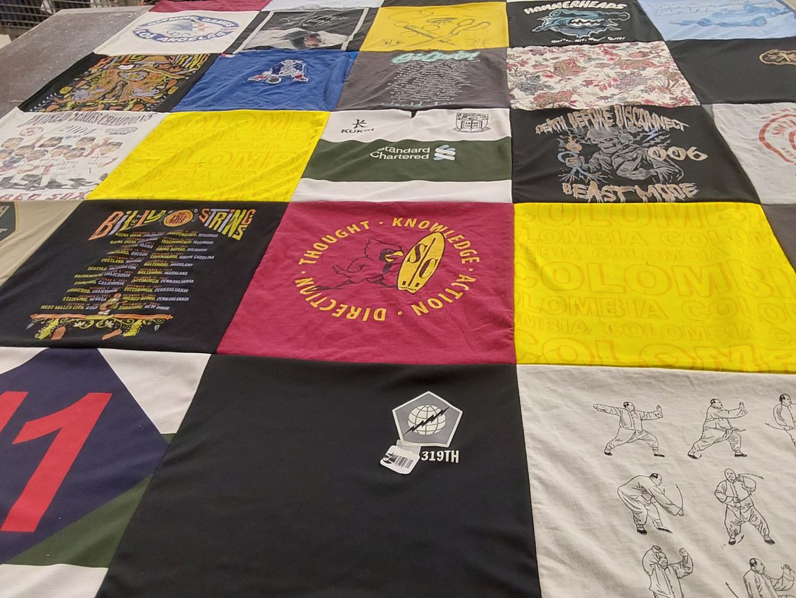 T-shirt quilt with music, art themes by Adam from CA