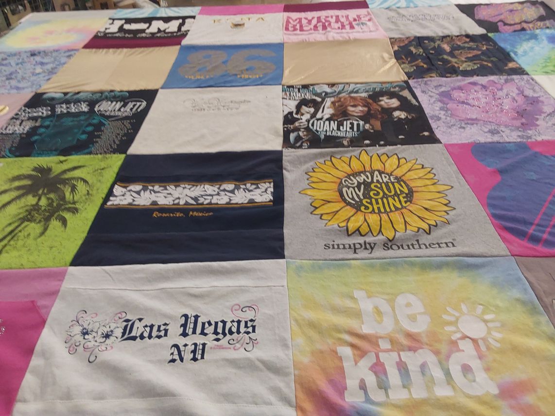 T-shirt quilt with music, travel themes by Pamela from VA
