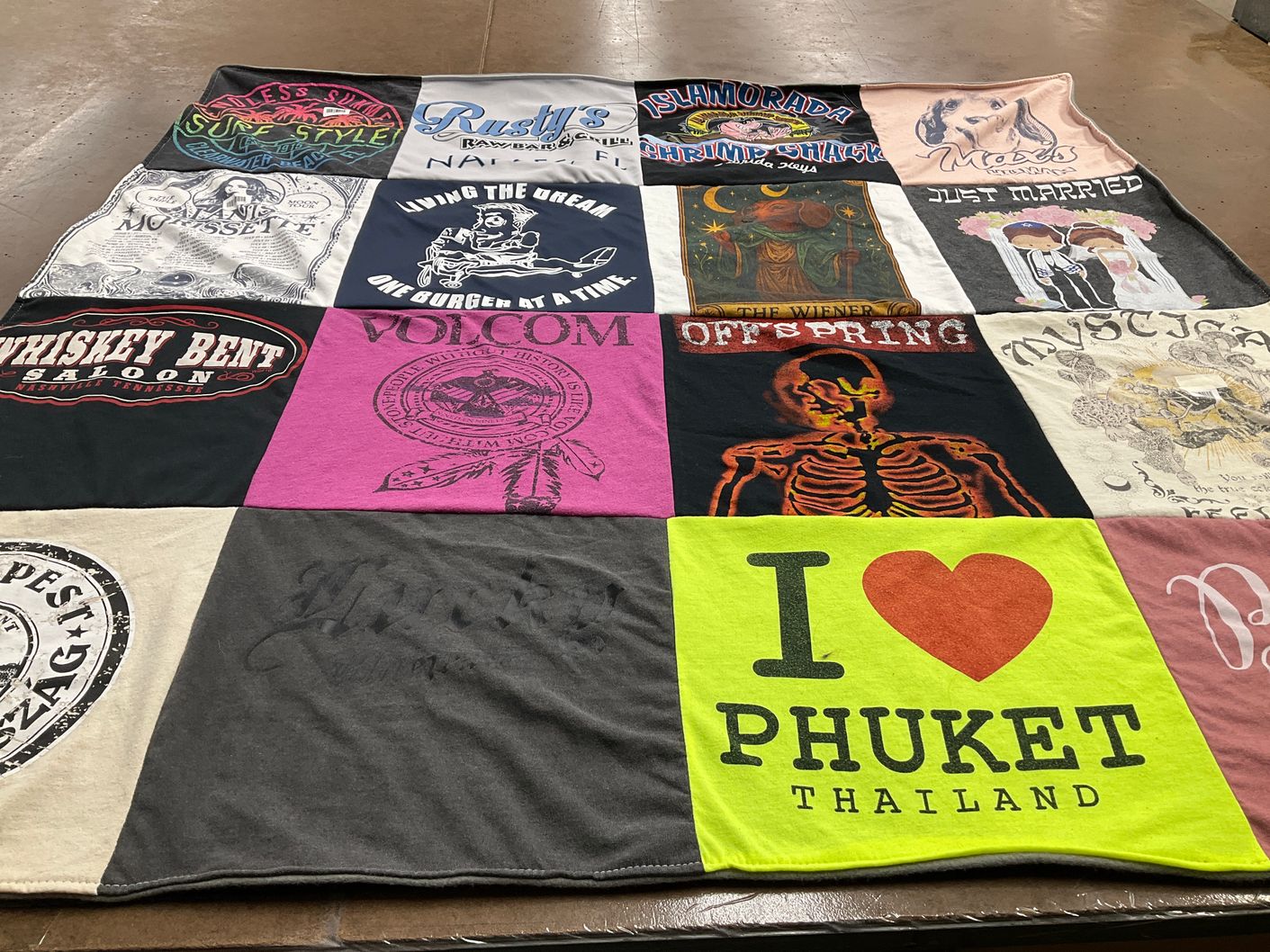 T-shirt quilt with travel, music themes by Michelle from FL