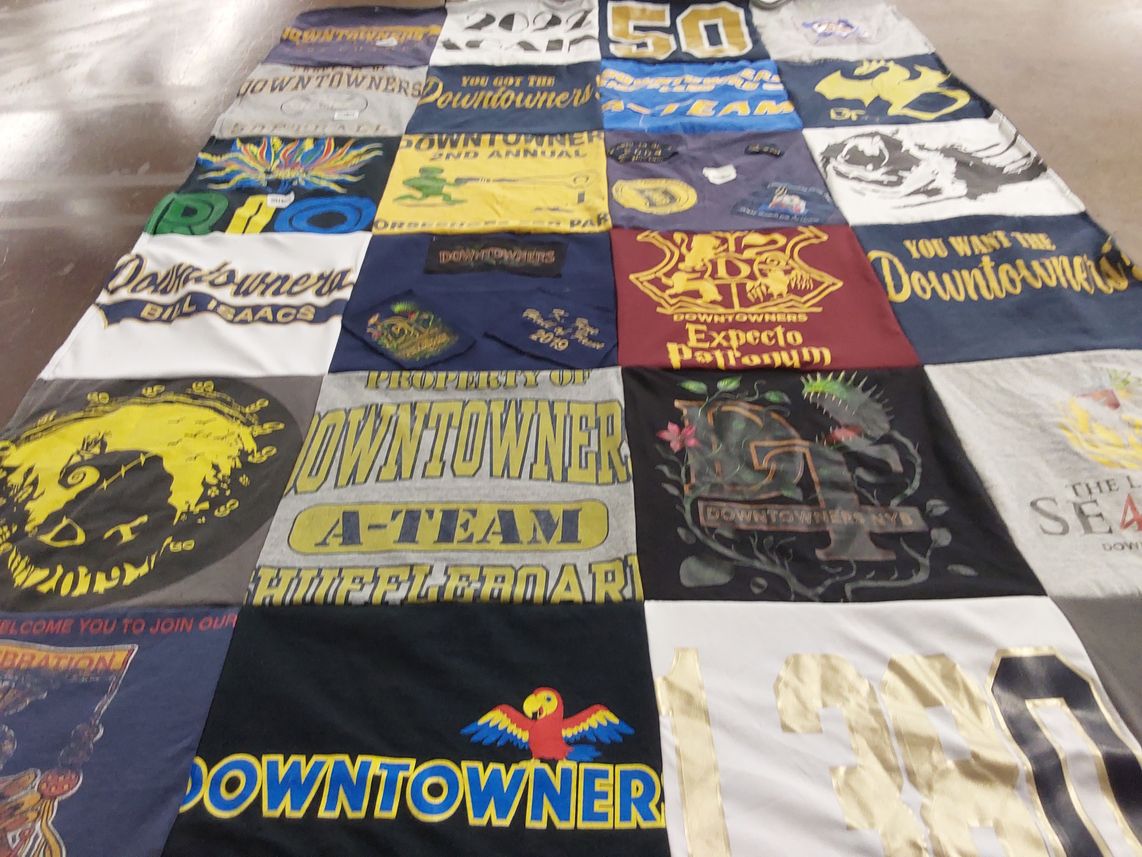 T-shirt quilt with community events, gatherings themes by Nicole from NJ