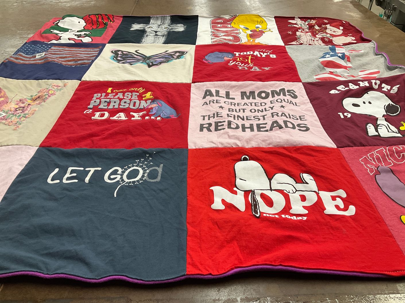 T-shirt quilt with cartoons, snoopy themes by Stephanie from MN