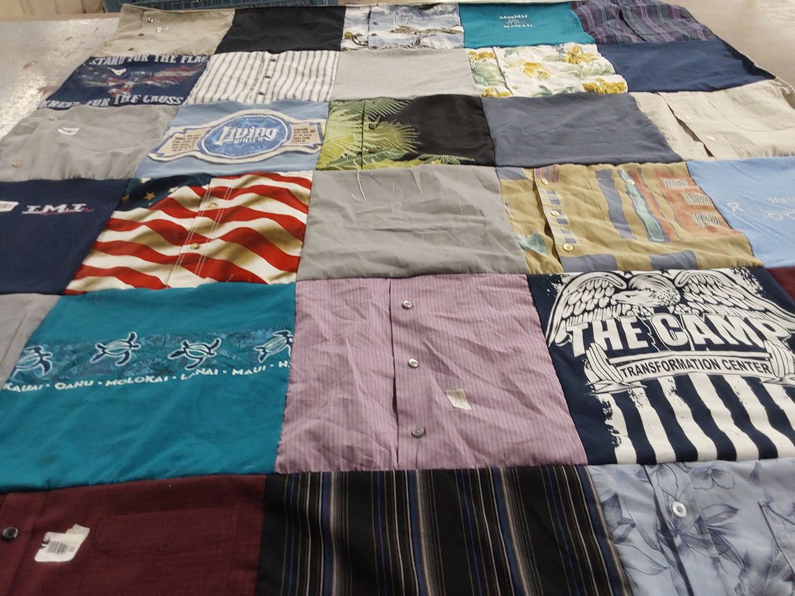 T-shirt quilt with travel, outdoors themes by Marina from CA