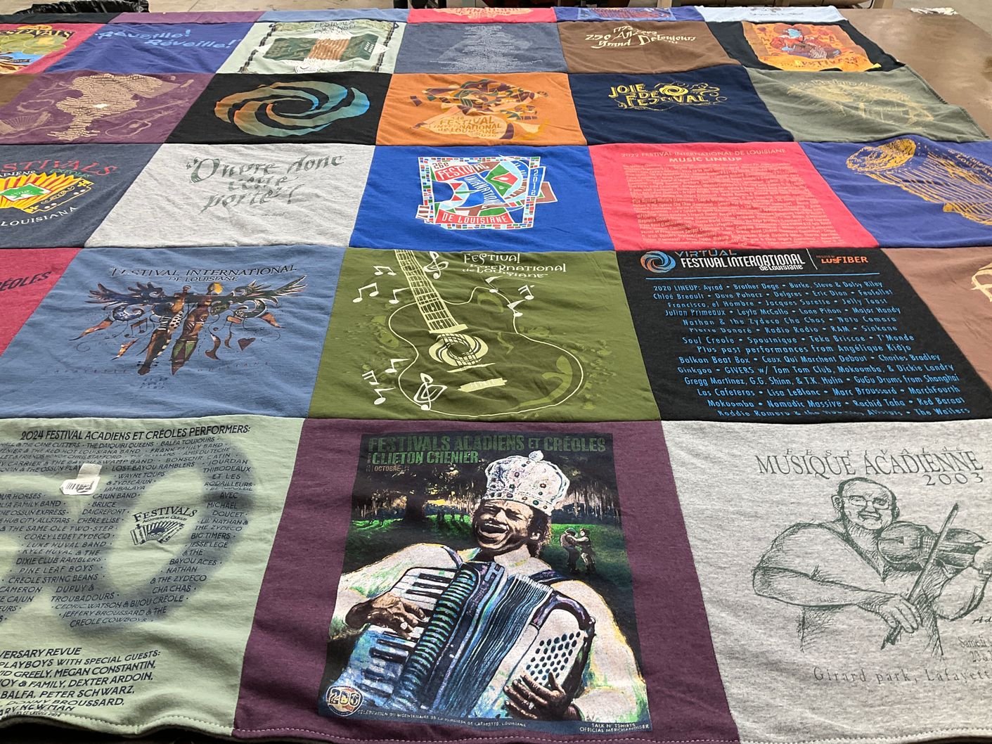T-shirt quilt with music festivals, cultural events themes by Taylor from TX