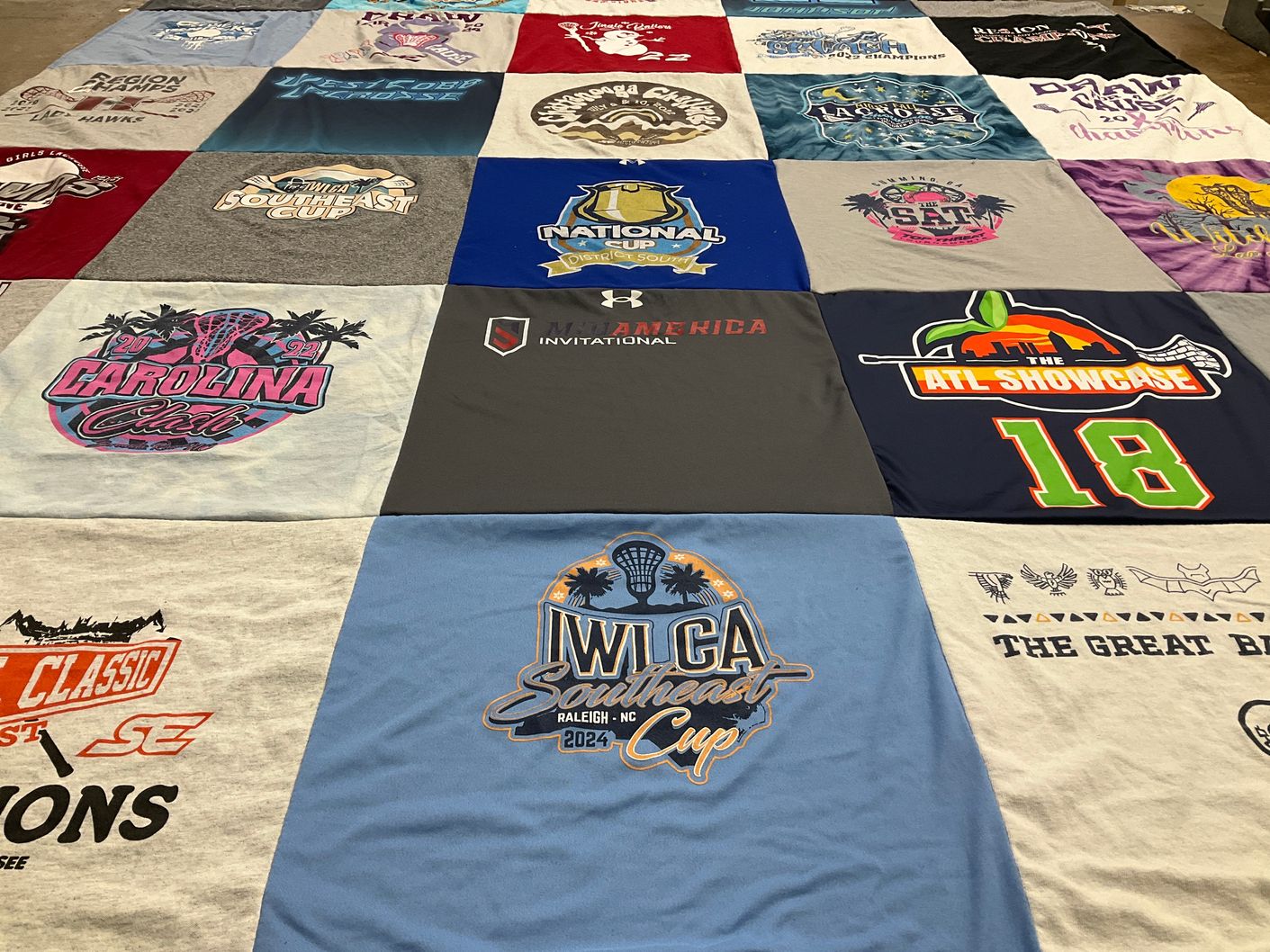 T-shirt quilt with lacrosse, sports themes by Kim from GA