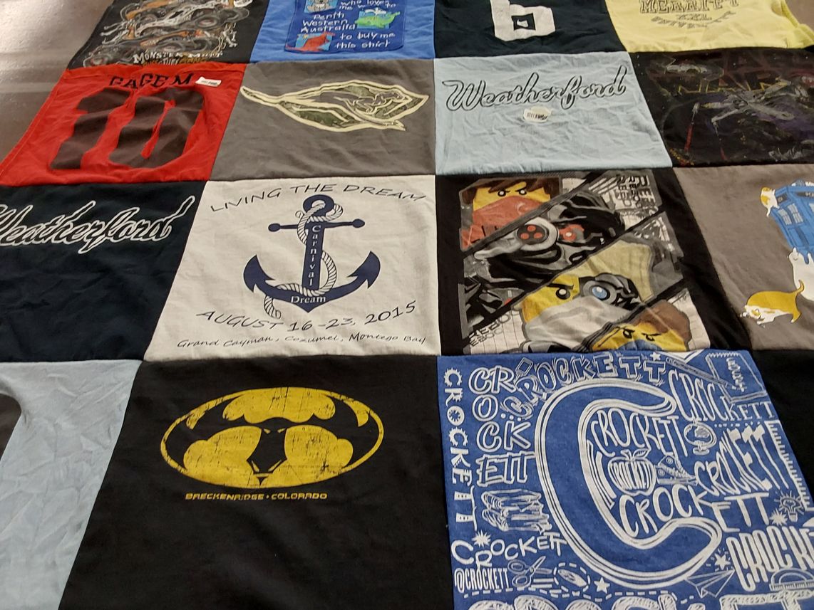 T-shirt quilt with travel, adventure themes by Monica J from TX