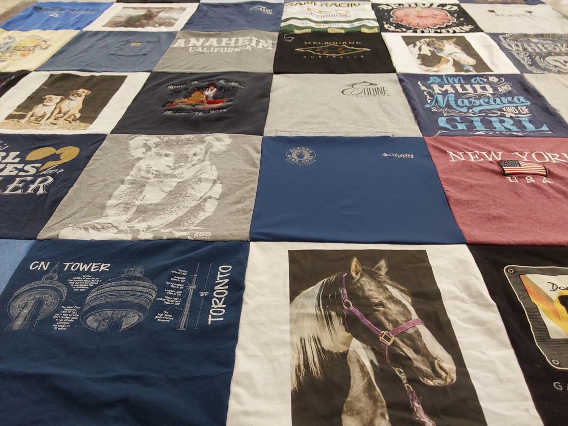 T-shirt quilt with animals, travel themes by Juli from CO