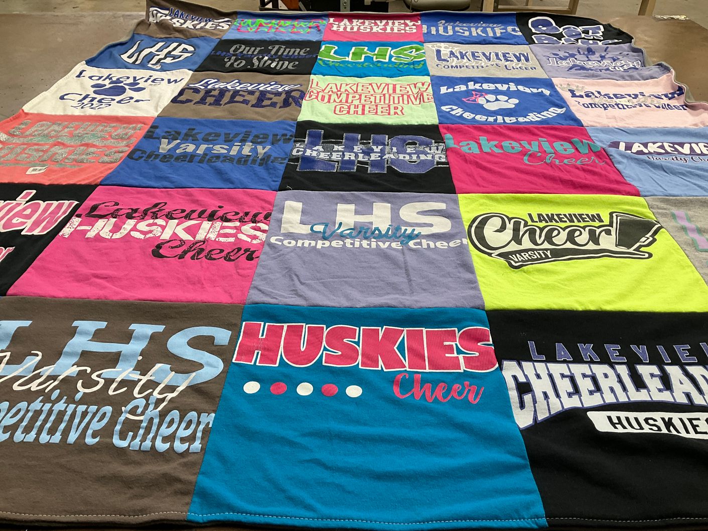 T-shirt quilt featuring lakeview huskies cheer by Elli from MI