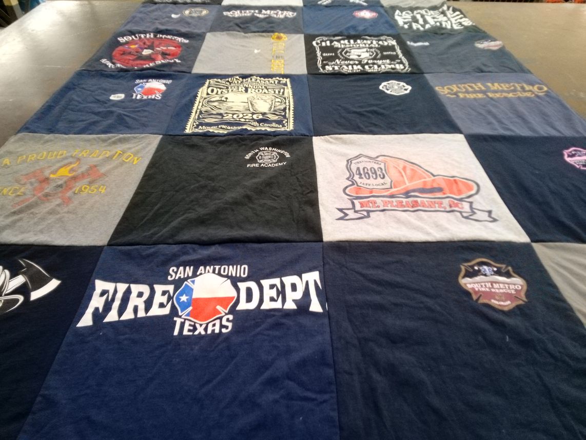T-shirt quilt with firefighting, emergency services themes by Jordan from SC