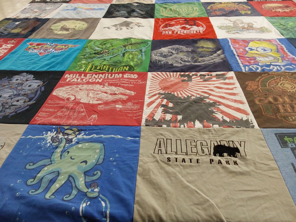 T-shirt quilt with science fiction, comics themes by Douglas from NY