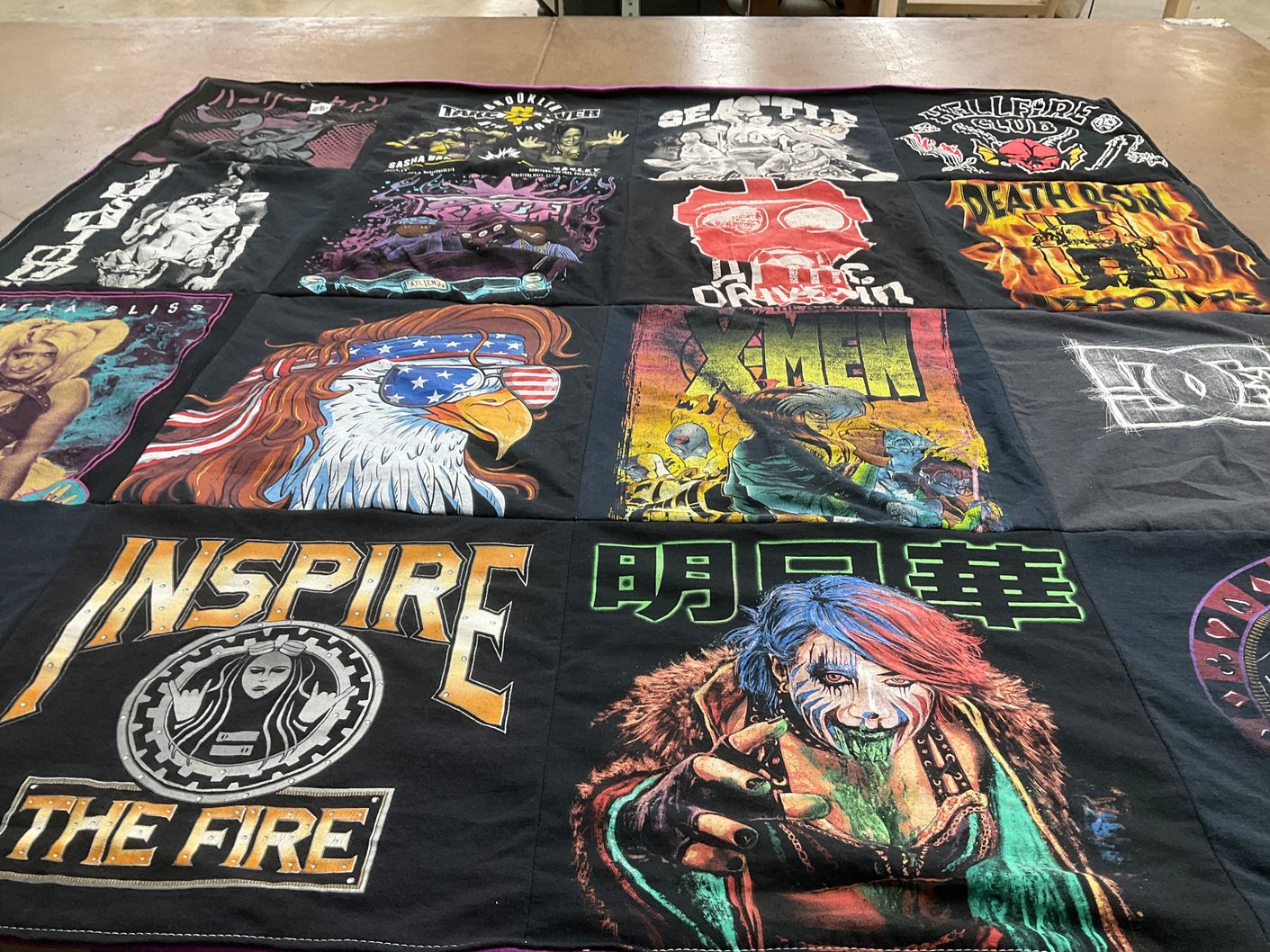 T-shirt quilt with comics, music themes by Marilyn from MD
