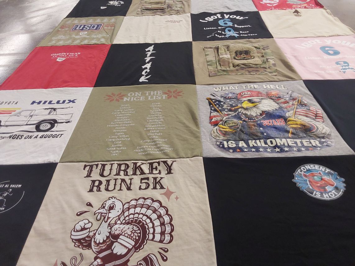 T-shirt quilt with running, biking themes by - from NY