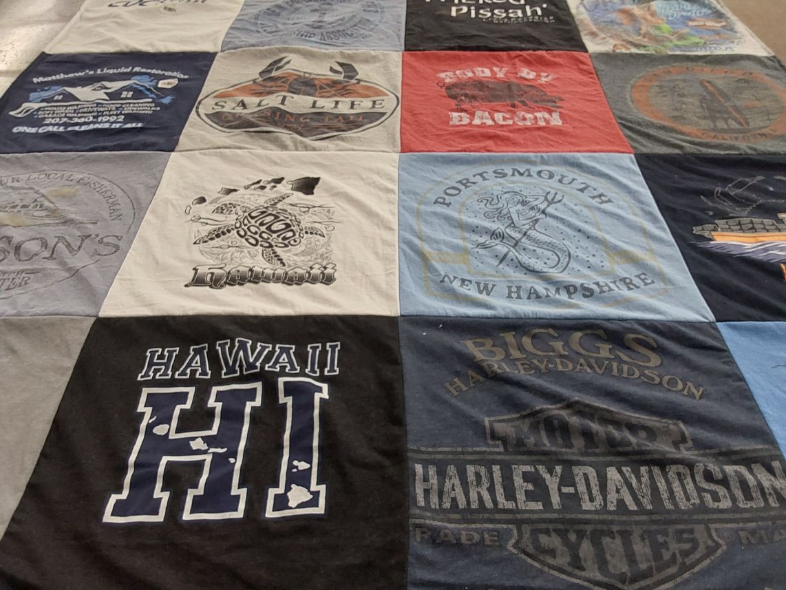 T-shirt quilt with fishing, motorcycles themes by Amy from ME