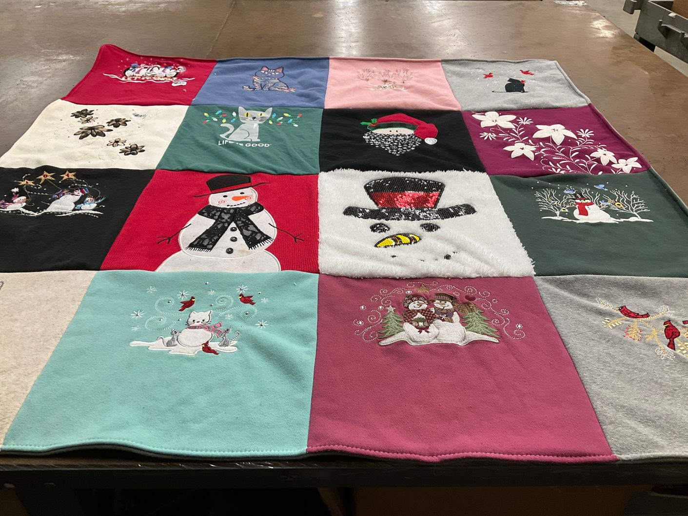 T-shirt quilt with seasonal decor, winter activities themes by Joann from PA