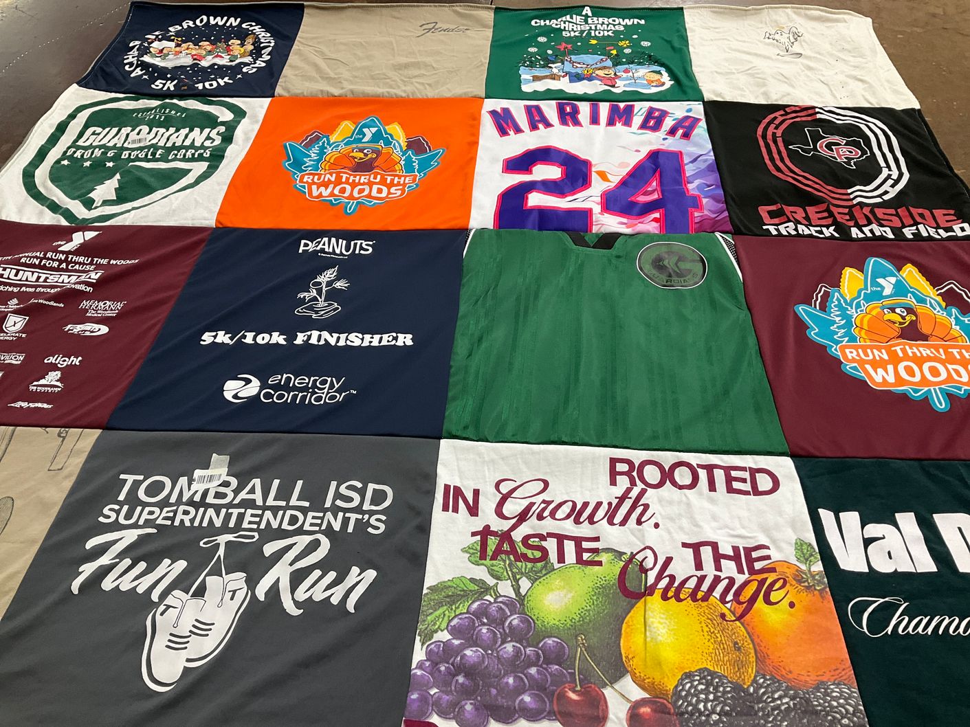 T-shirt quilt with running, sports themes by Deah from TX