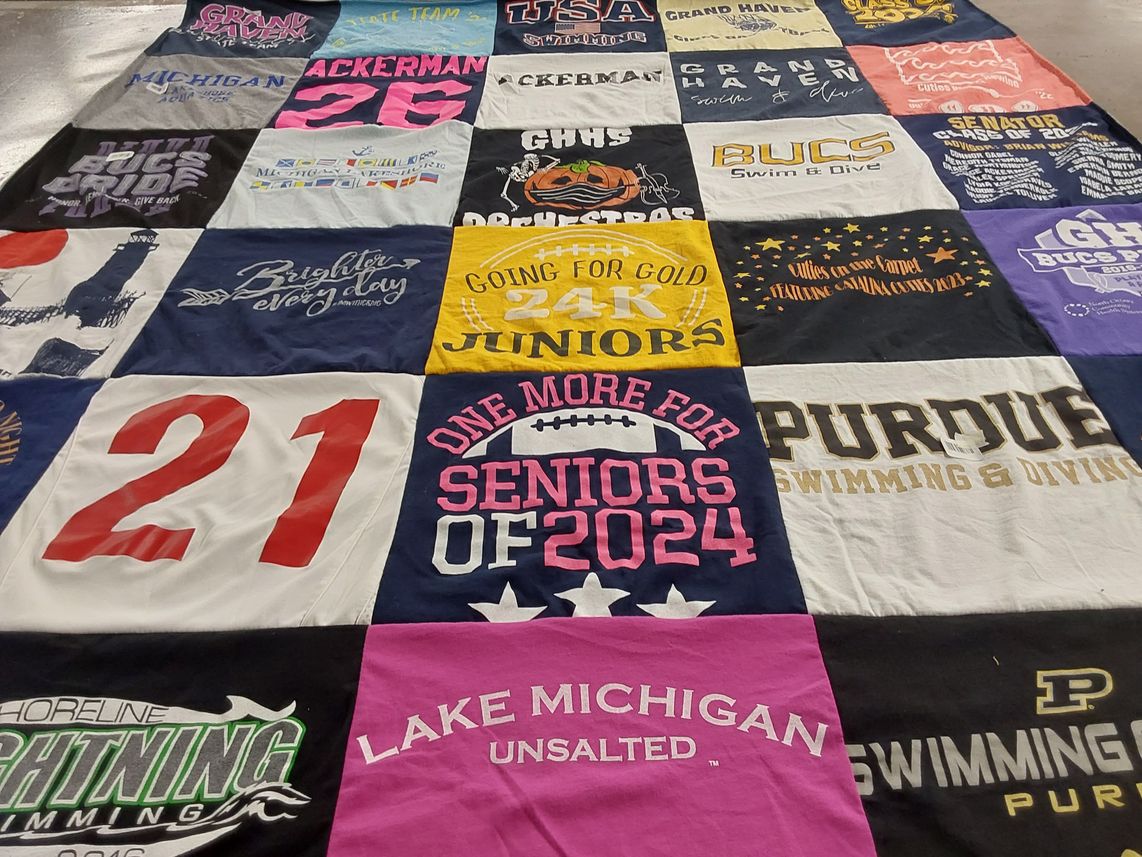 T-shirt quilt featuring bucs swimming and diving by Amy from MI