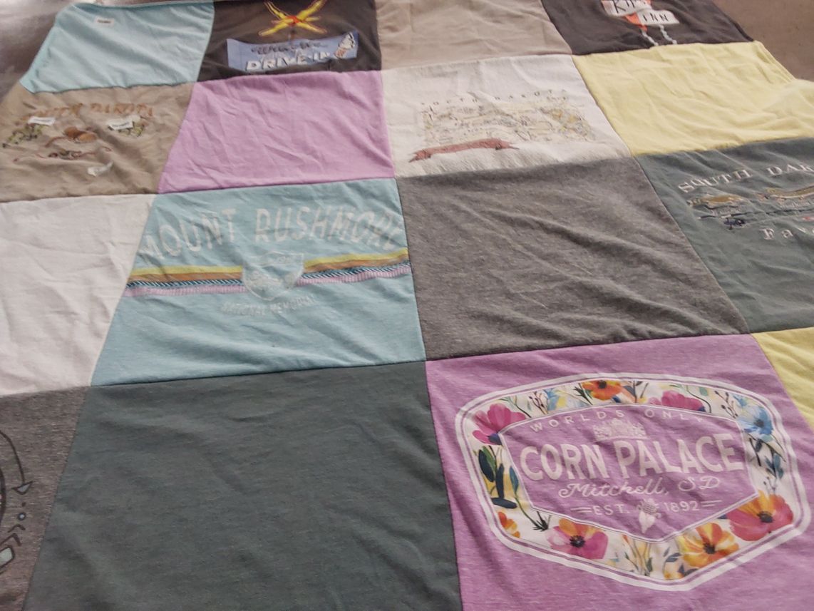 T-shirt quilt with travel, tourism themes by Sandra from OH