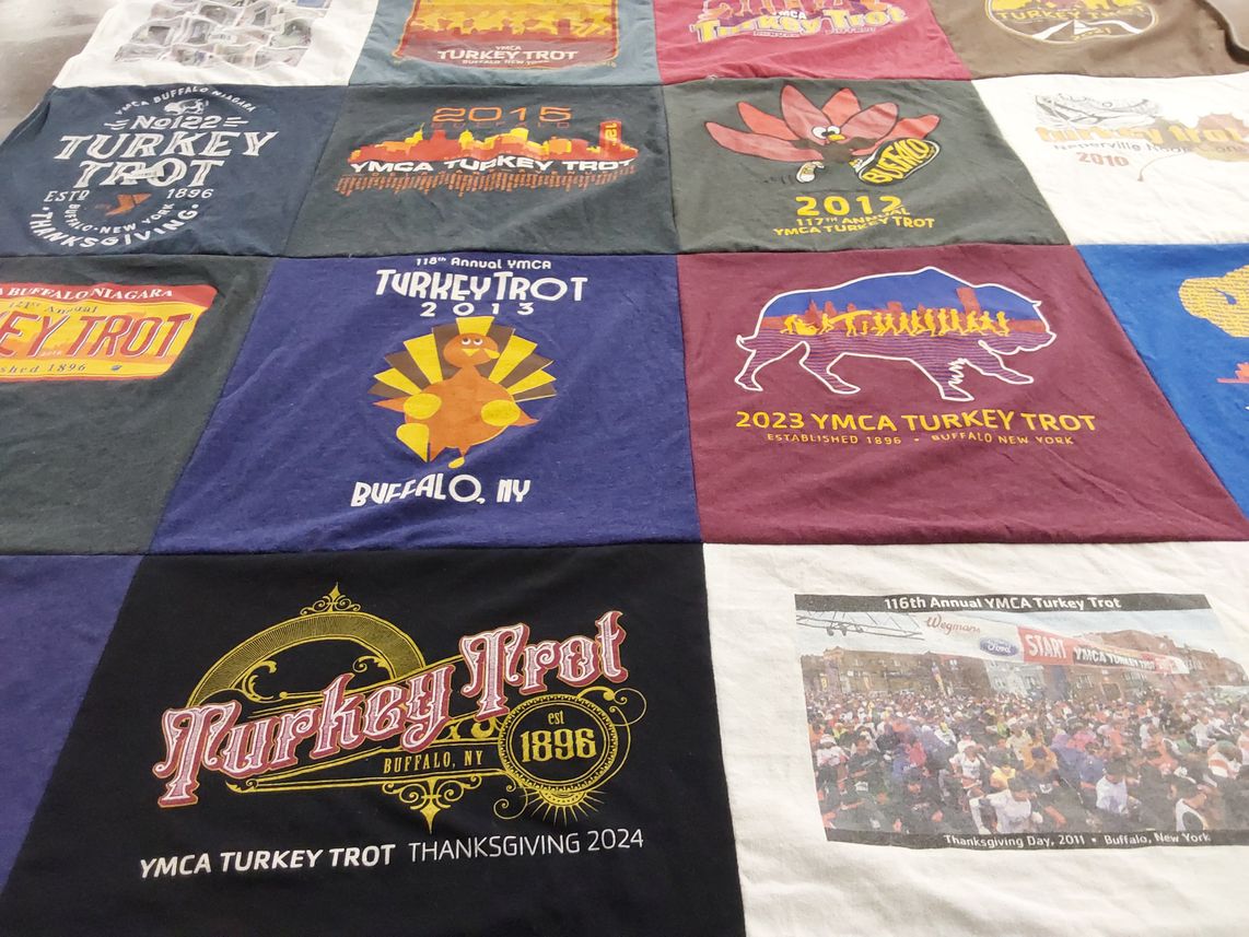T-shirt quilt with running, community events themes by Lolita from NY