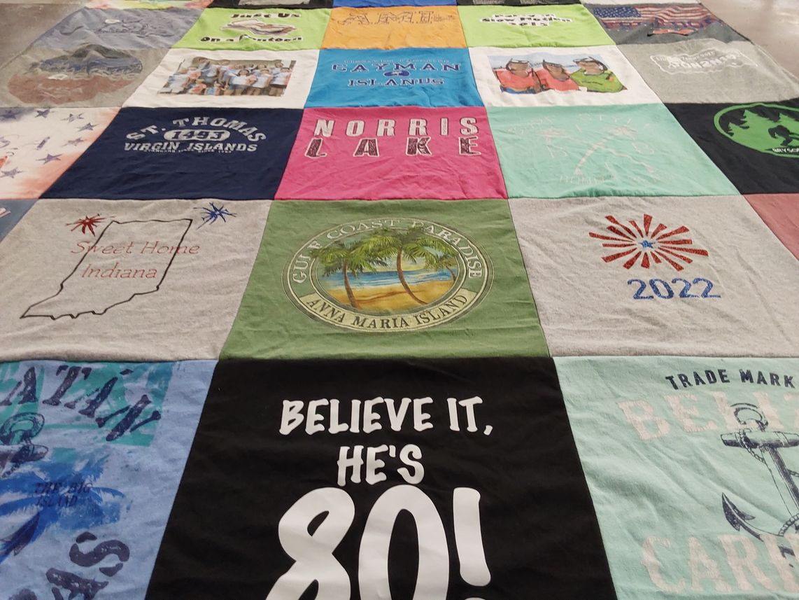 T-shirt quilt with travel, beach themes by Audra from IN
