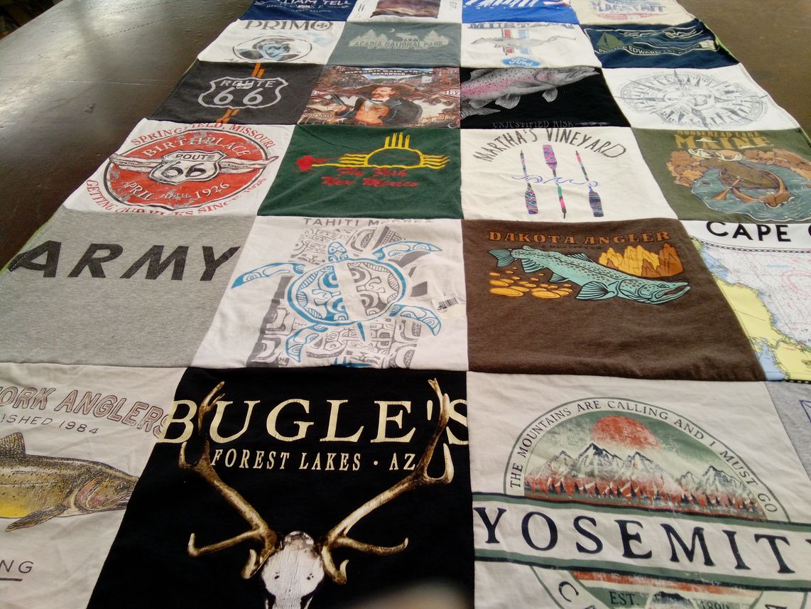 T-shirt quilt with hiking, fishing themes by David from WI
