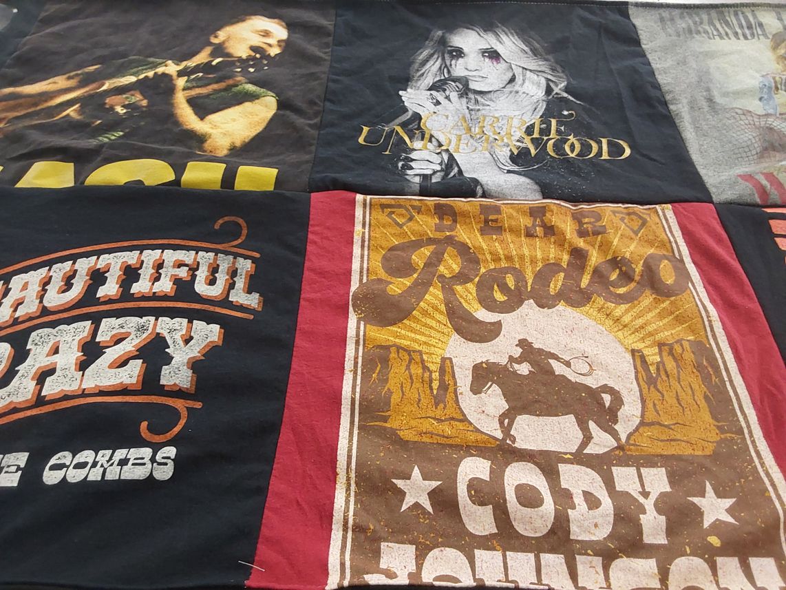 T-shirt quilt with country music themes by Anna Lauren from GA
