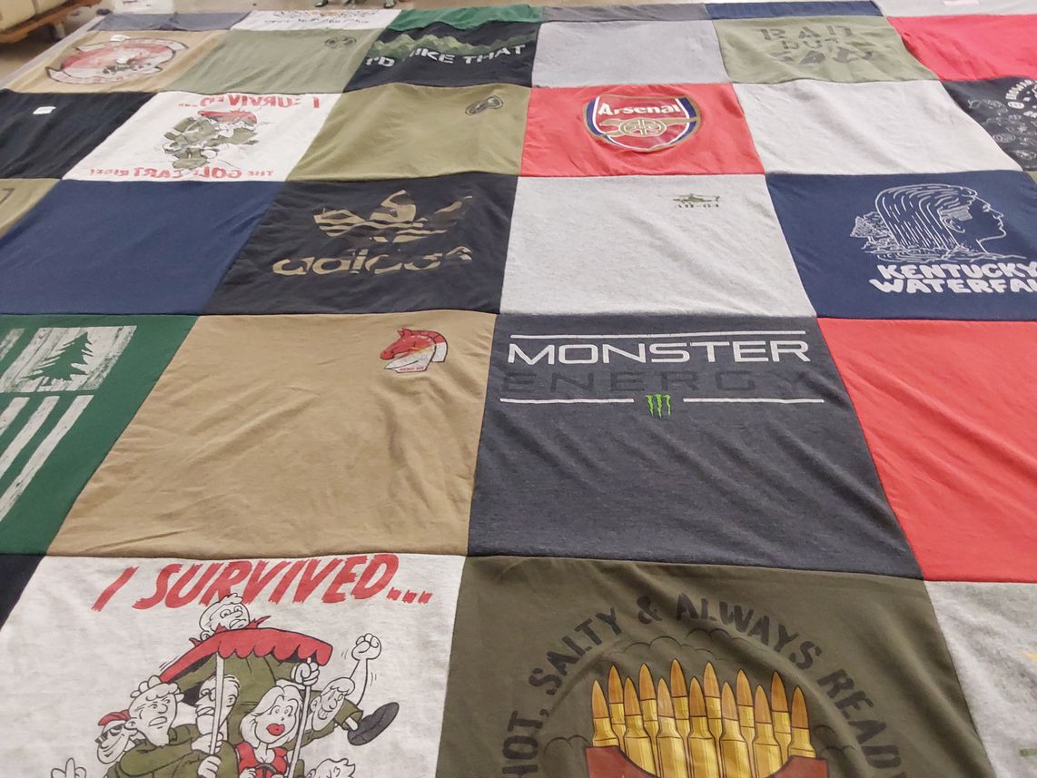 T-shirt quilt with sports, outdoors themes by AnnMarie from IN