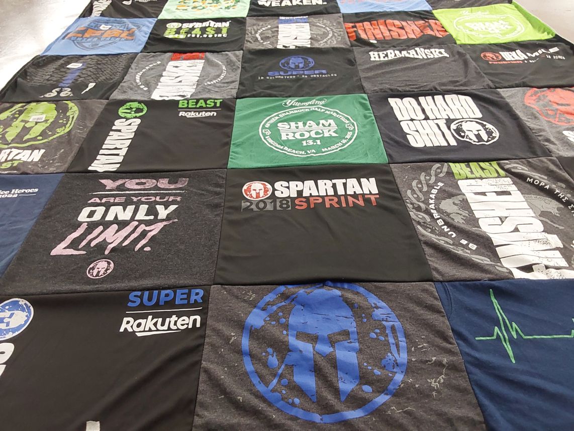 T-shirt quilt with fitness, obstacle course racing themes by Noreen from NC