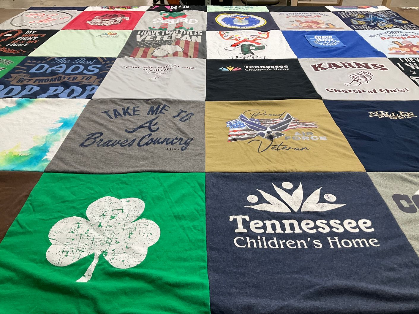 T-shirt quilt with veterans, community service themes by Melissa from TN