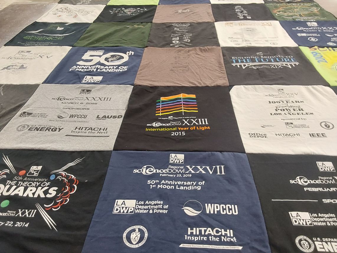 T-shirt quilt with science, energy themes by Tiffany from CA