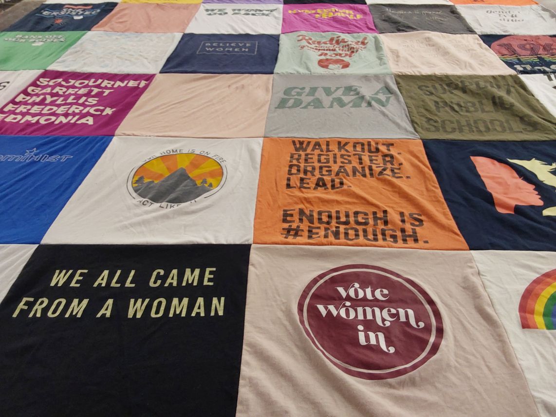 T-shirt quilt with feminism, activism themes by Emily from TX