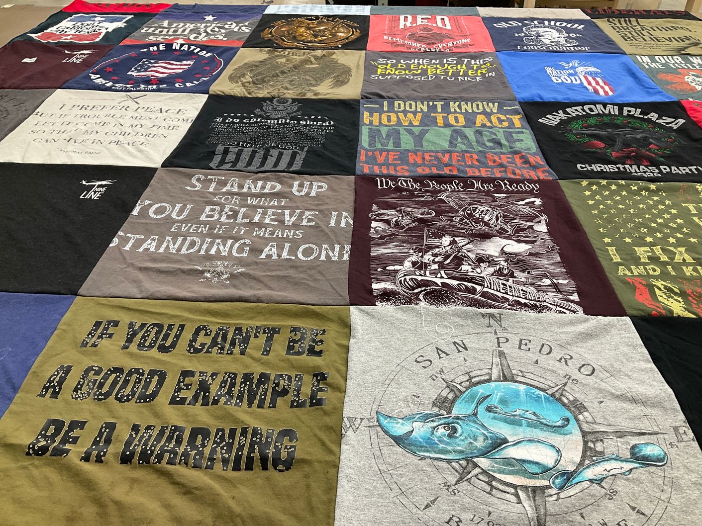 T-shirt quilt with patriotism, fishing themes by Ty from TX