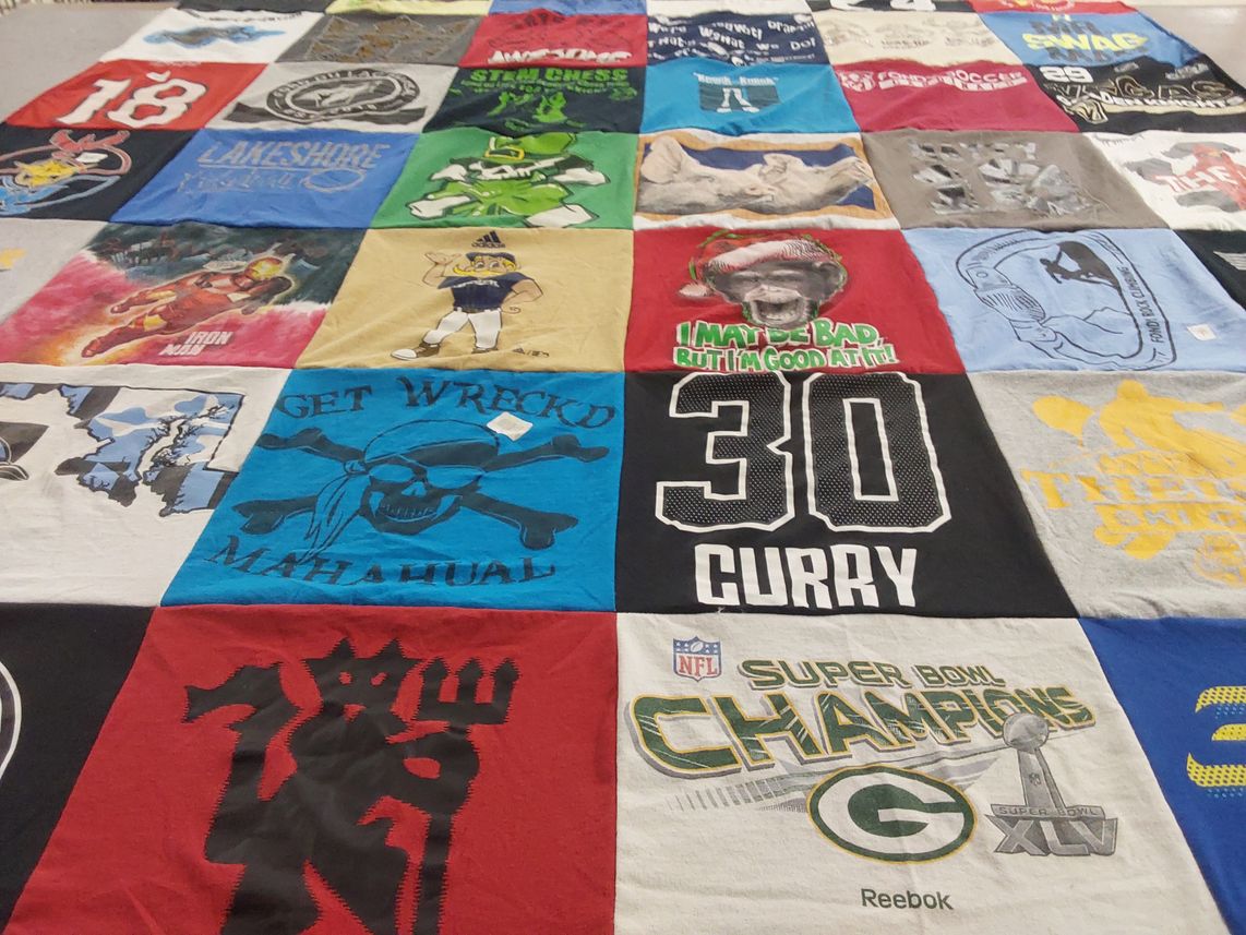 T-shirt quilt with sports, video games themes by MELODY from WI