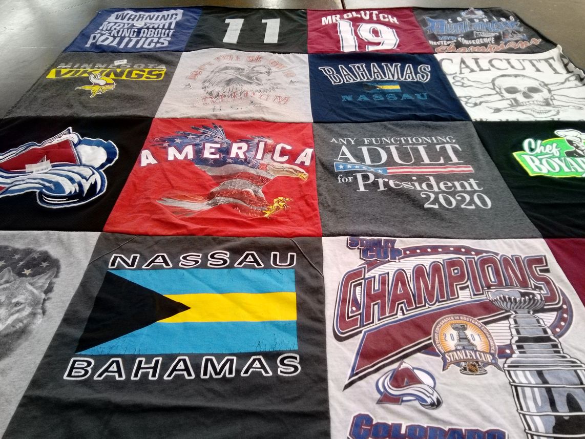 T-shirt quilt featuring minnesota vikings, colorado avalanche by Jan from MT