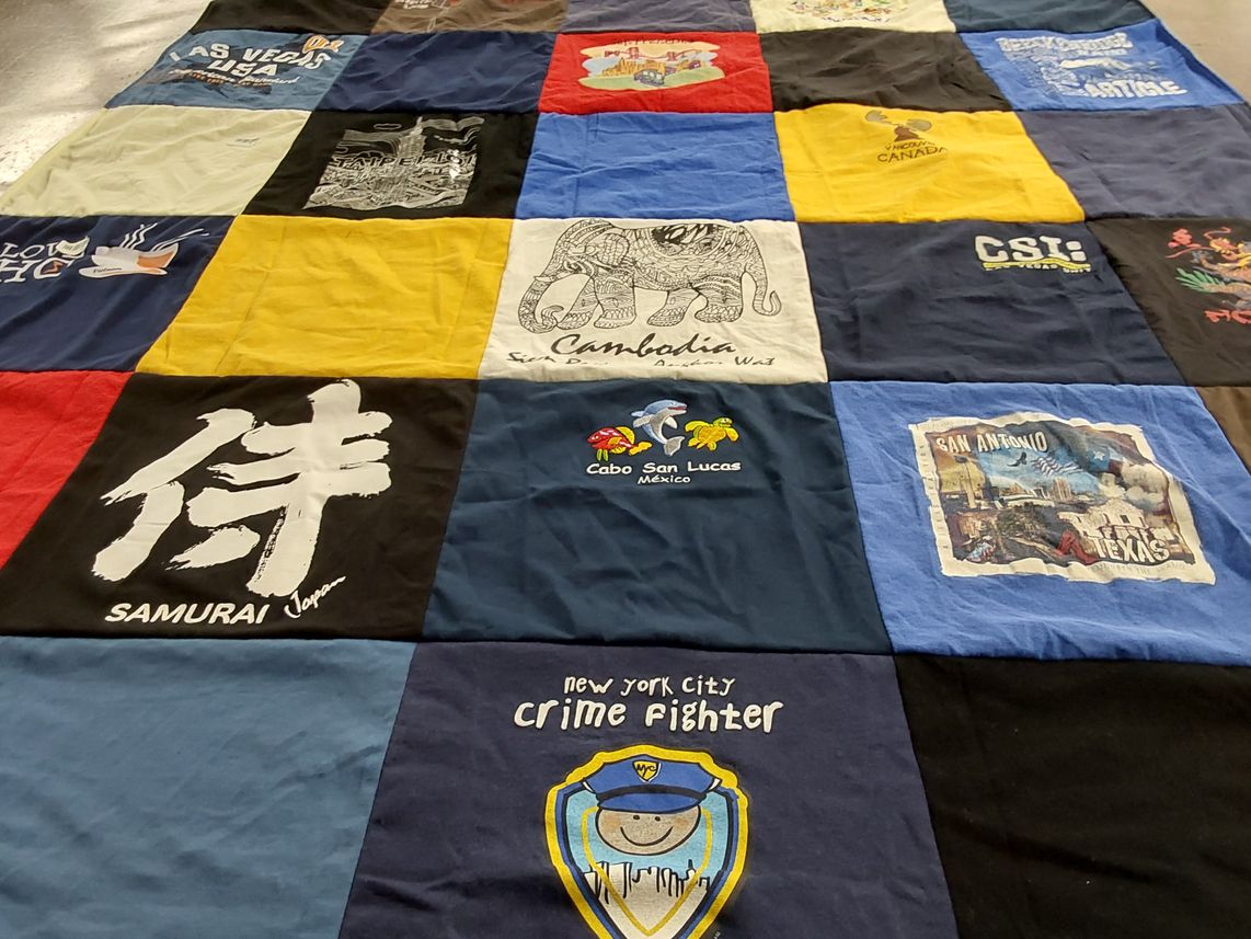 T-shirt quilt with travel, culture themes by Quynh from CA